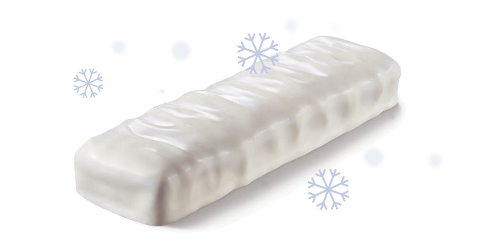 zero candy bar covered in white fudge surrounded by snowflakes
