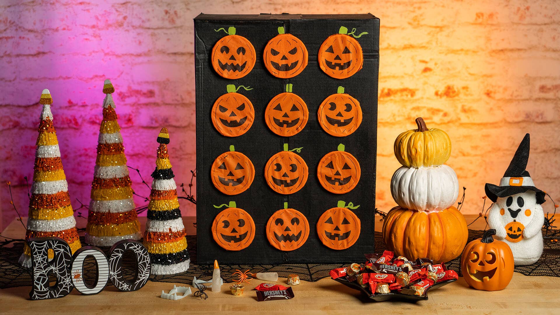 poke a pumpkin game on halloween themed table