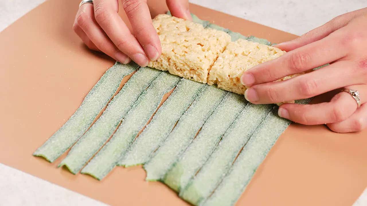 crispy rice treats placed on sour strips