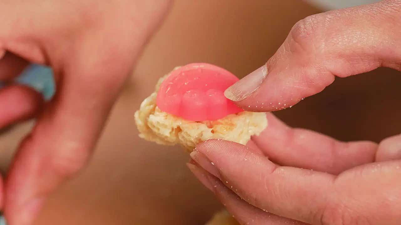 jolly rancher gummy placed on top of cereal treat pieces