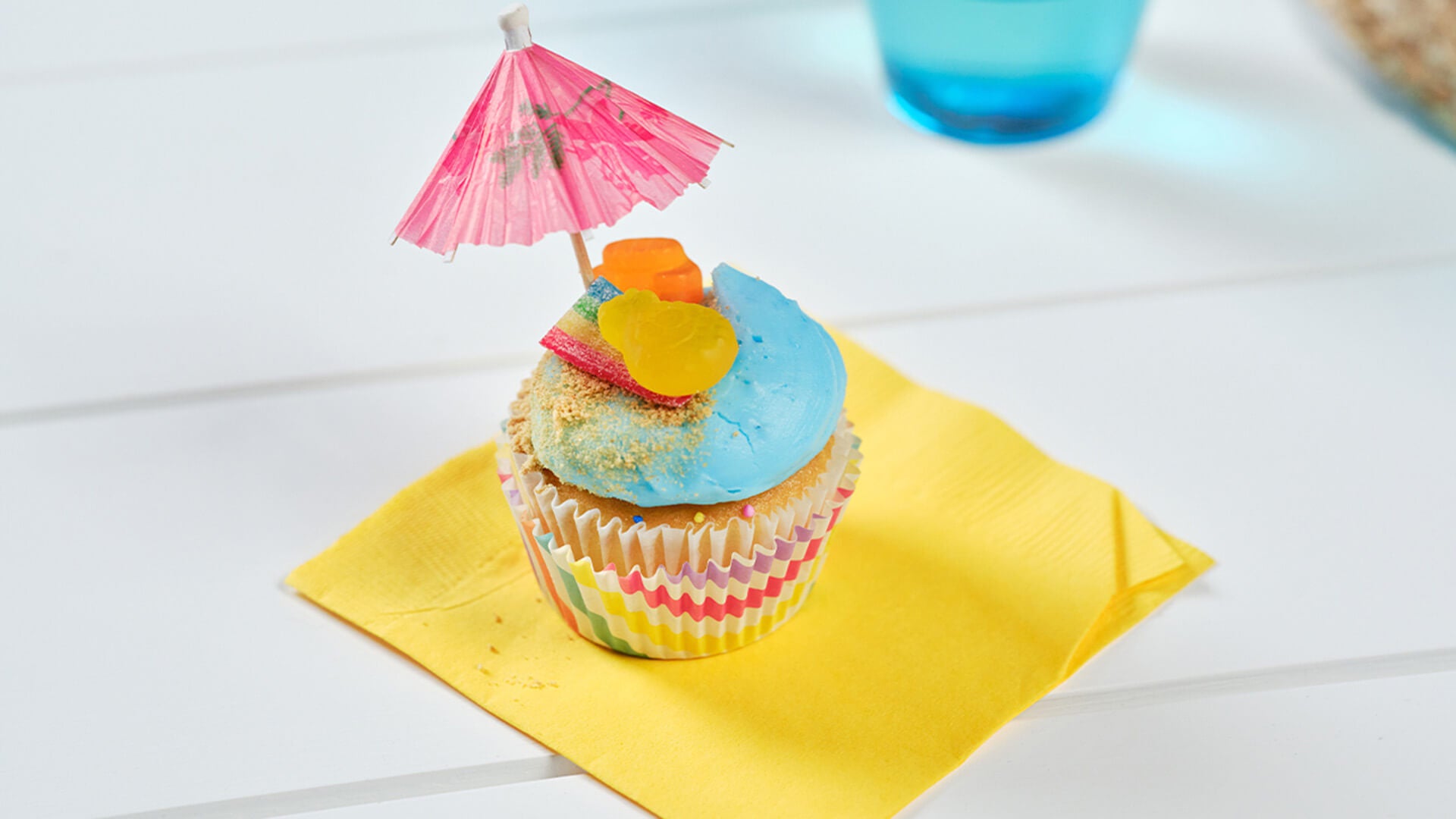 napkin topped with beach day cupcake ready to serve
