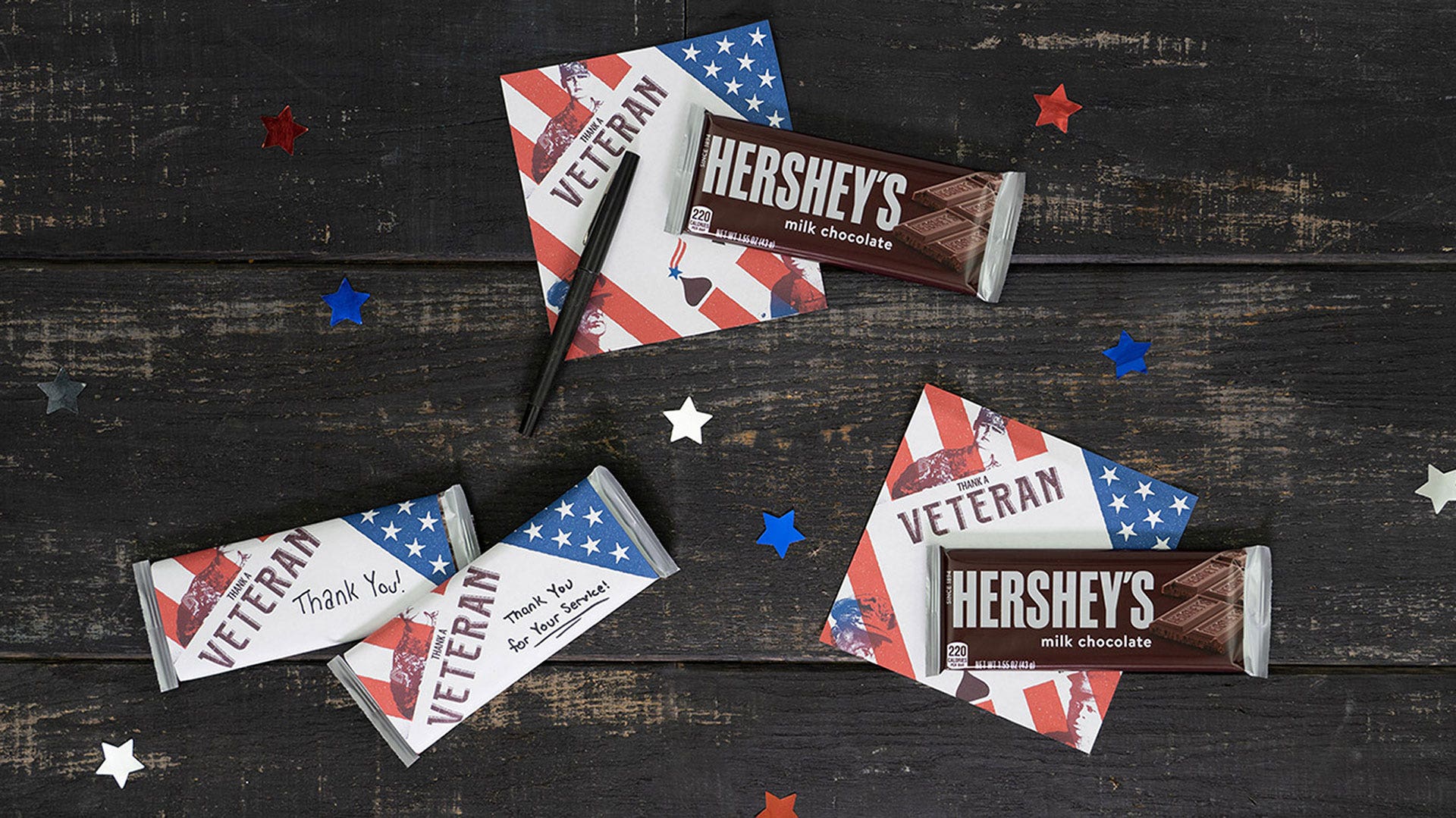 personalized thank a veteran candy bar wrappers on a table with hershey bars