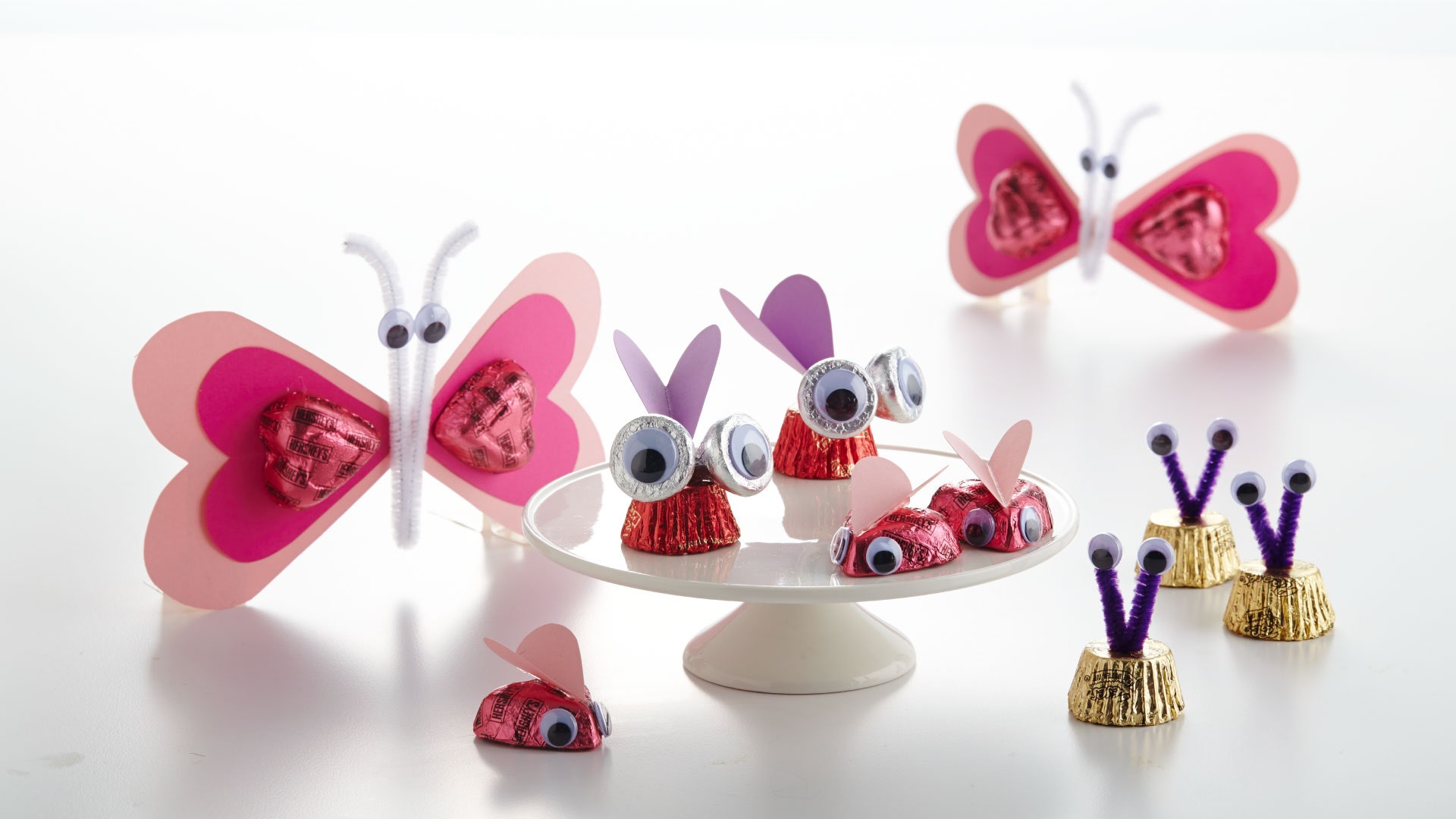 Valentine Lovebugs- construction paper hearts, googly eyes, craft sticks  and pipe cleaner.