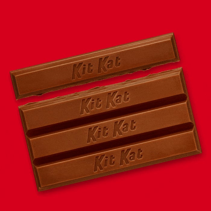 Break me off a piece of that Kit Kat bar that tastes like a chocolate  frosted doughnut 