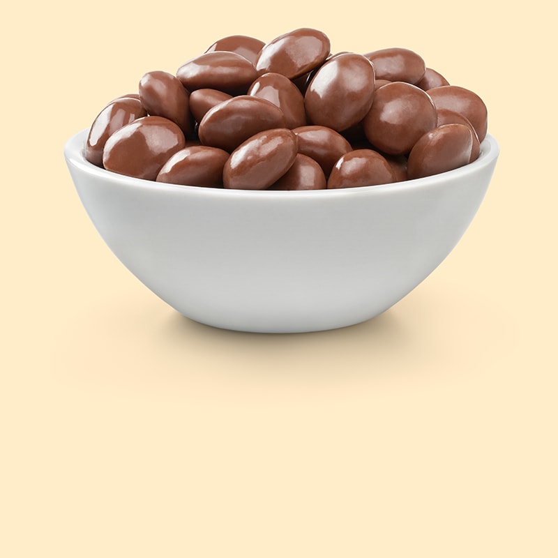 Milk Duds in white bowl