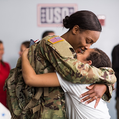 USO soldier and her daughter