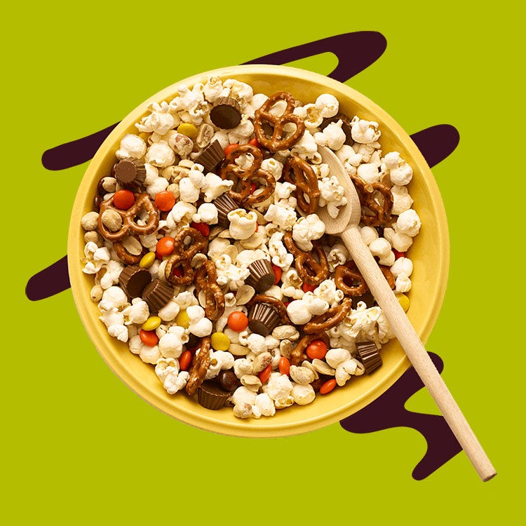 bowl of hersheys trail mix made with salty snacks and sweet candy