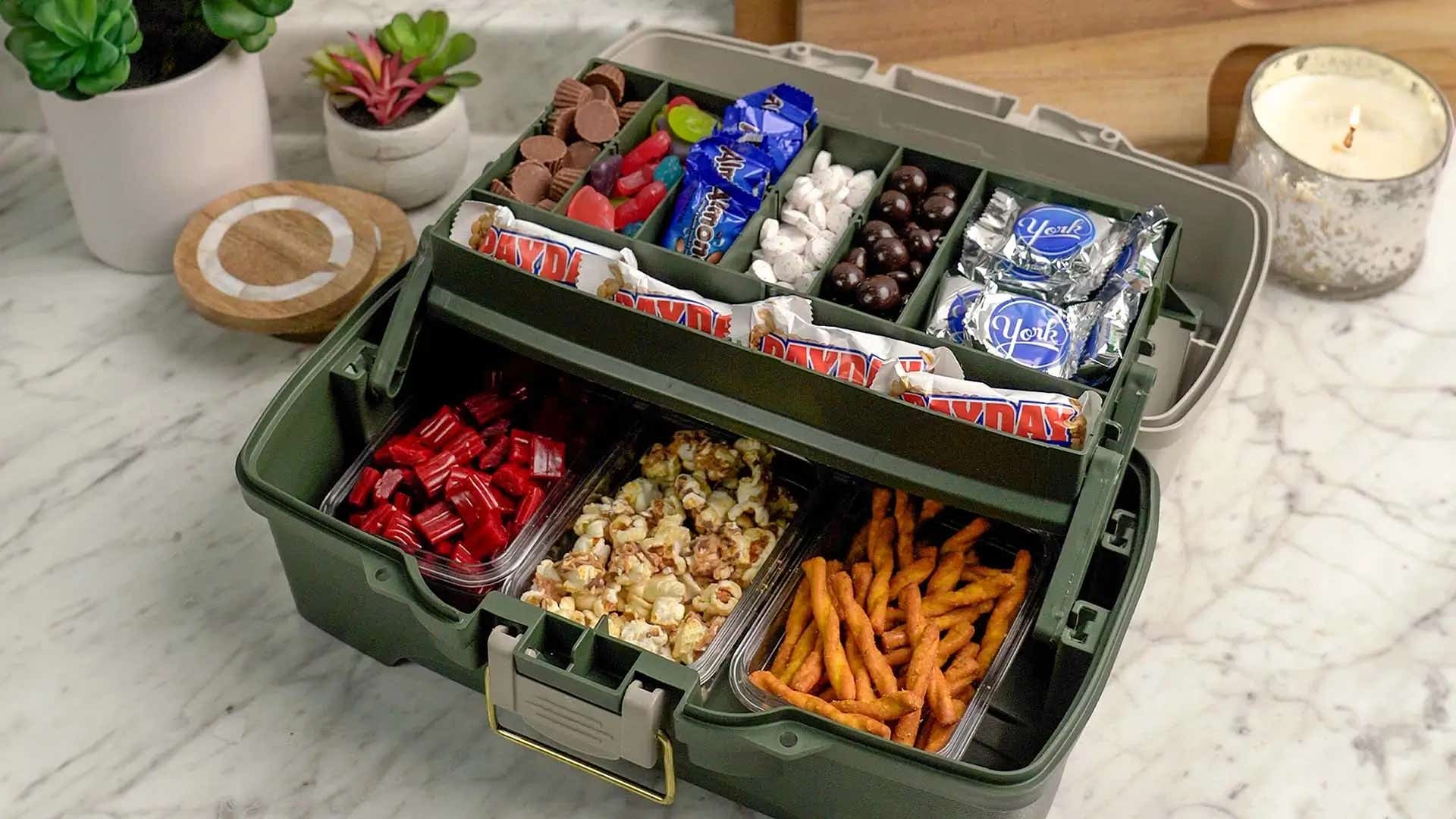 snackle box filled with assorted hersheys candies and salt snacks