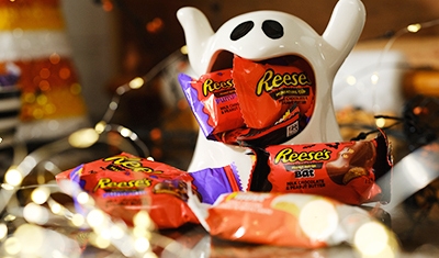 reeses cups on halloween themed table