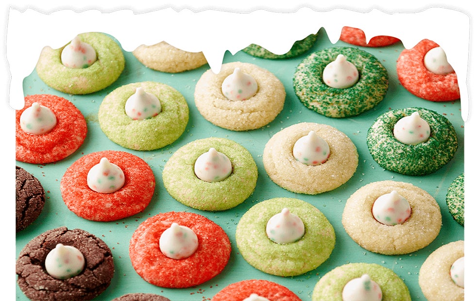 batch of freshly made hersheys holiday sugar cookie blossoms