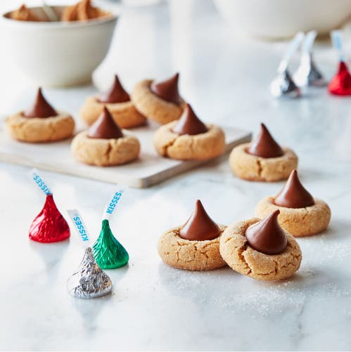 holiday themed hershey kisses cookie blossoms