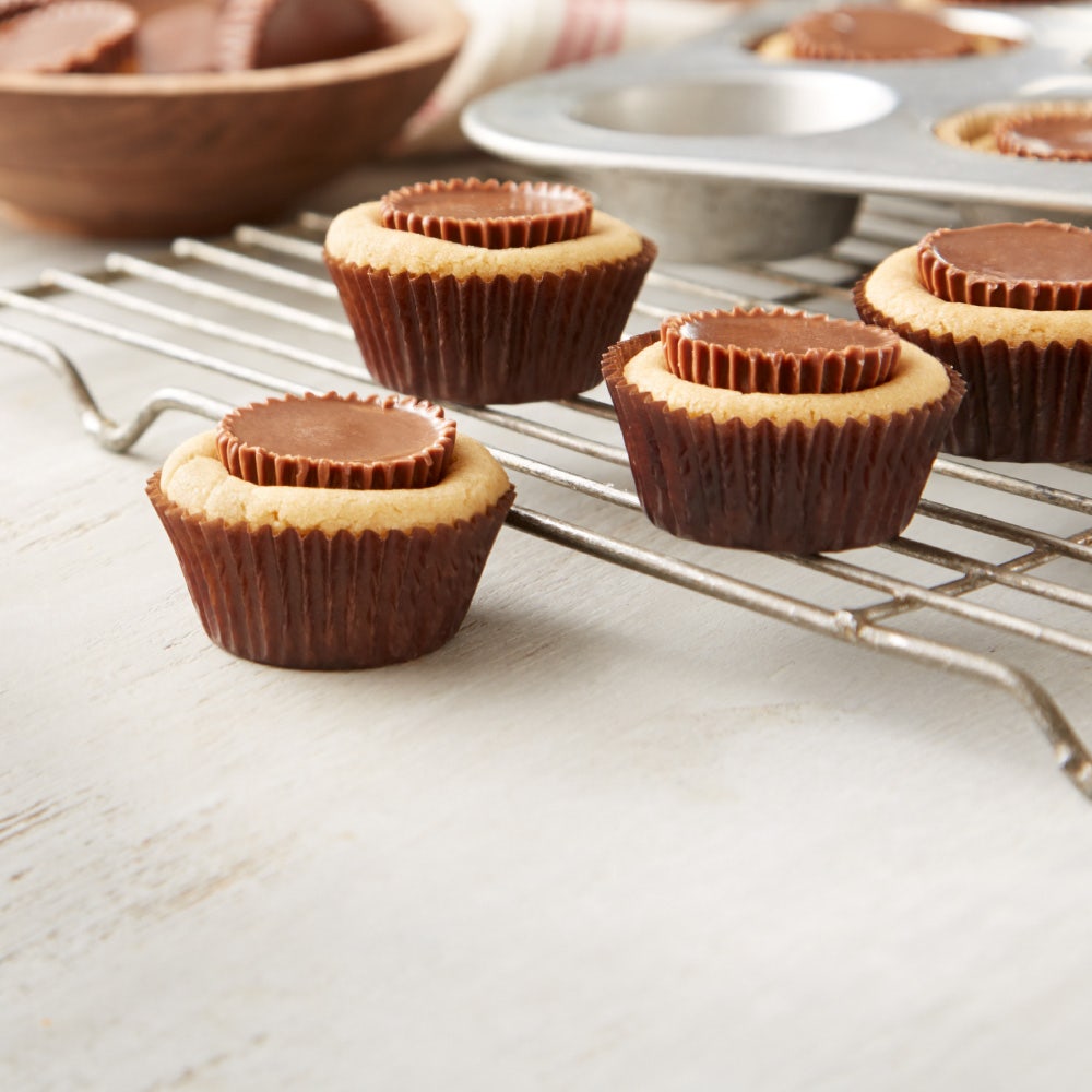 cupcakes with reeses cups pressed into the center