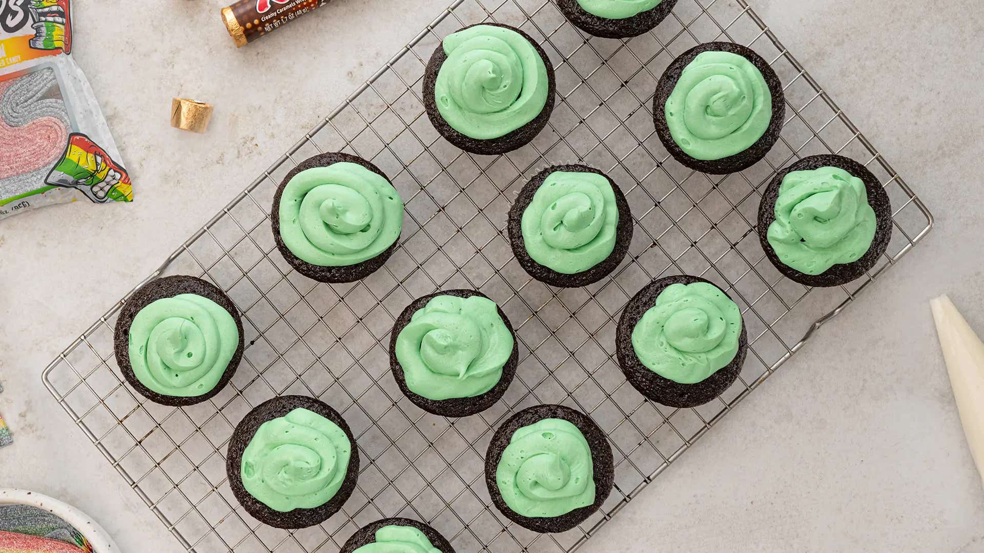 icing piped onto cupcakes