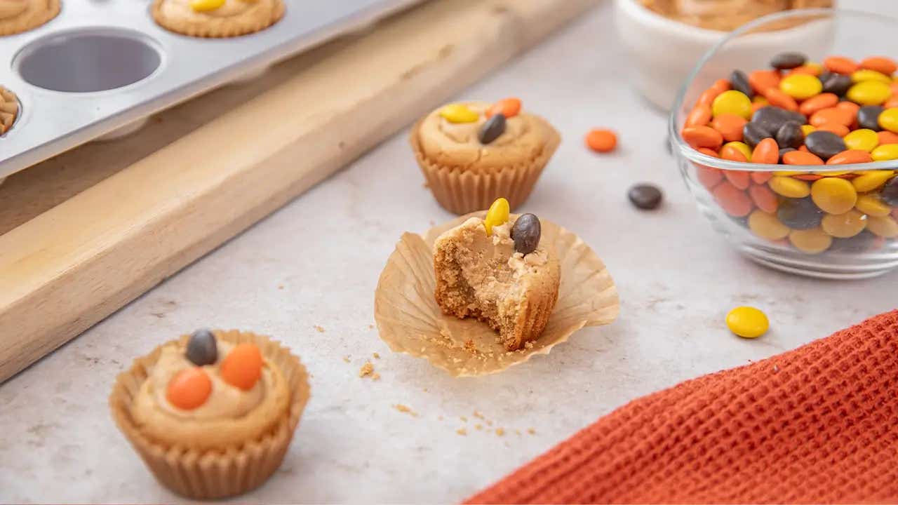 reeses pieces peanut butter temptation with bite taken out of it