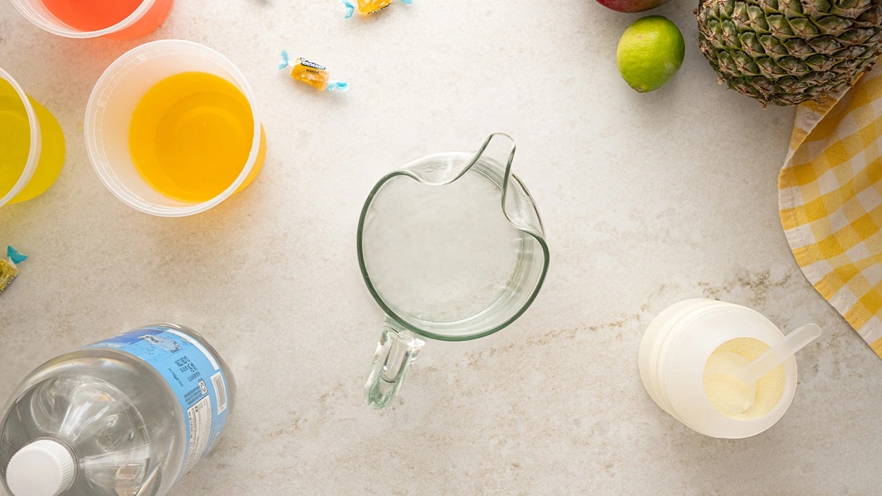 kitchen counter topped with recipe equipment and ingredients