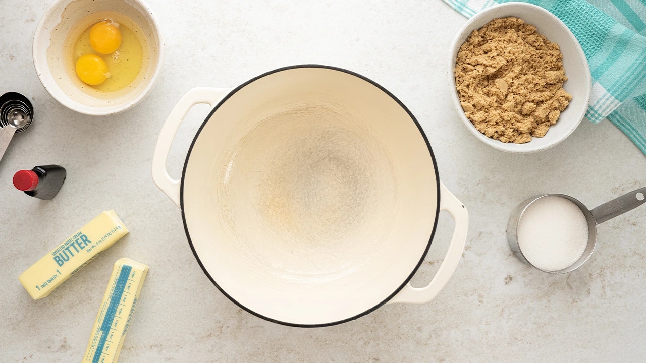 kitchen counter topped with recipe equipment and ingredients