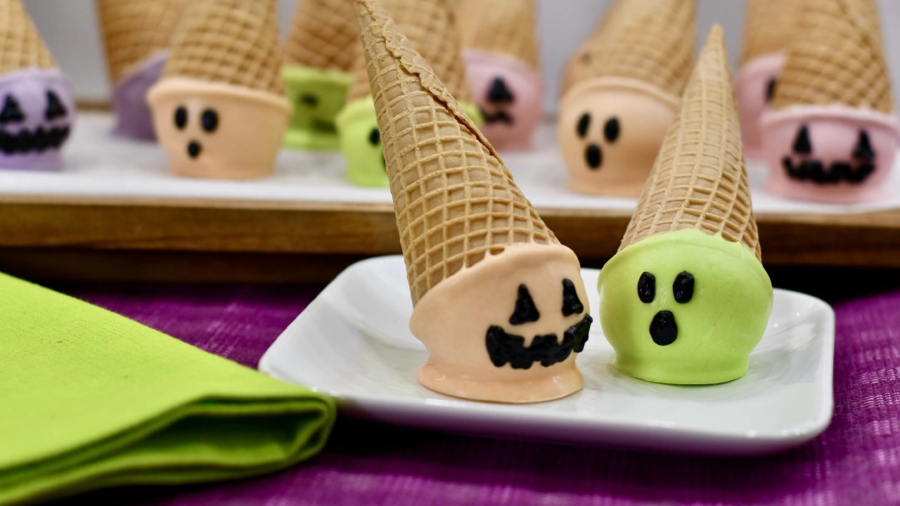 plate of green and orange summerween ice cream cone cake pops ready to serve