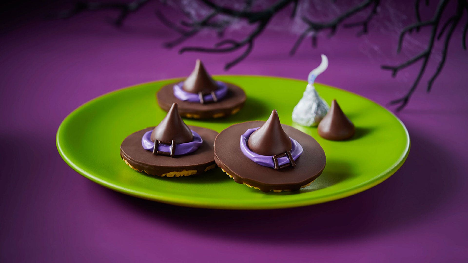 A fudge striped cookie and a Hershey's kiss make this super simple Halloween party snack spooky and delicious.