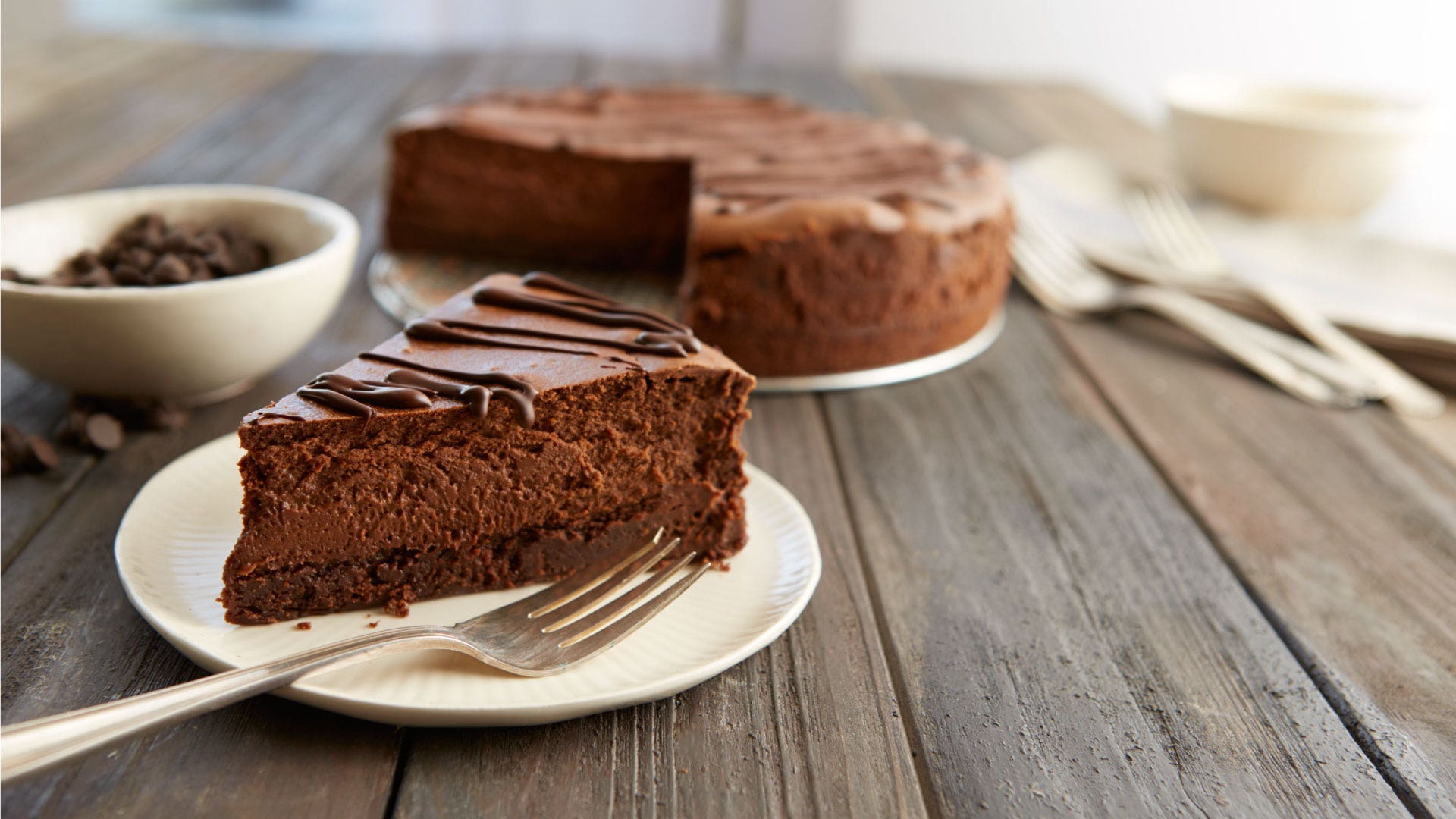 Image of HERSHEY'S SPECIAL DARK Chocolate Truffle Brownie Cheesecake