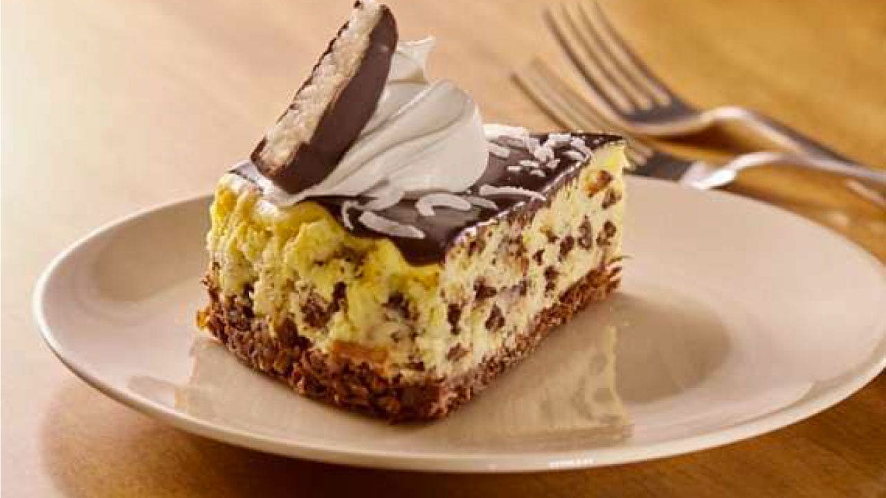 MOUNDS Candy Coconut Cheesecake With Chocolate Glaze