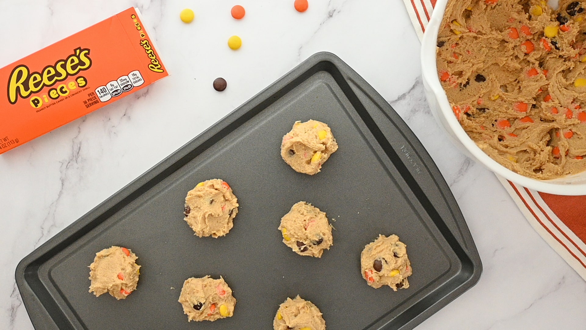 cookie dough added to cookie sheet