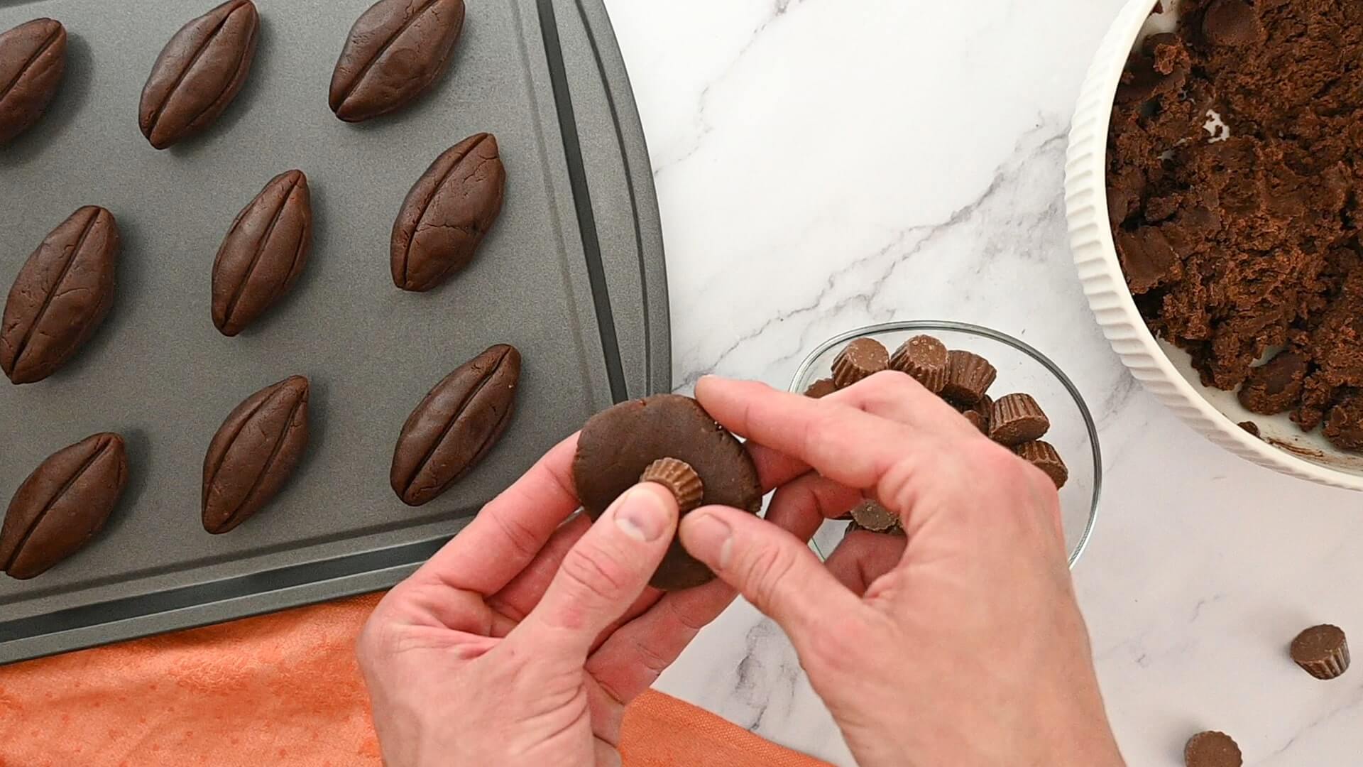 cookie dough molded around mini reeses cups