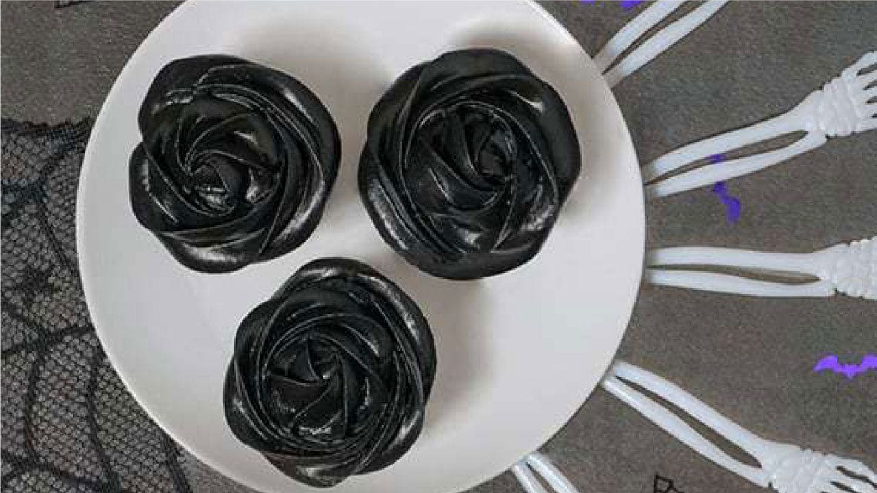 black rose cupcakes with buttercream frosting