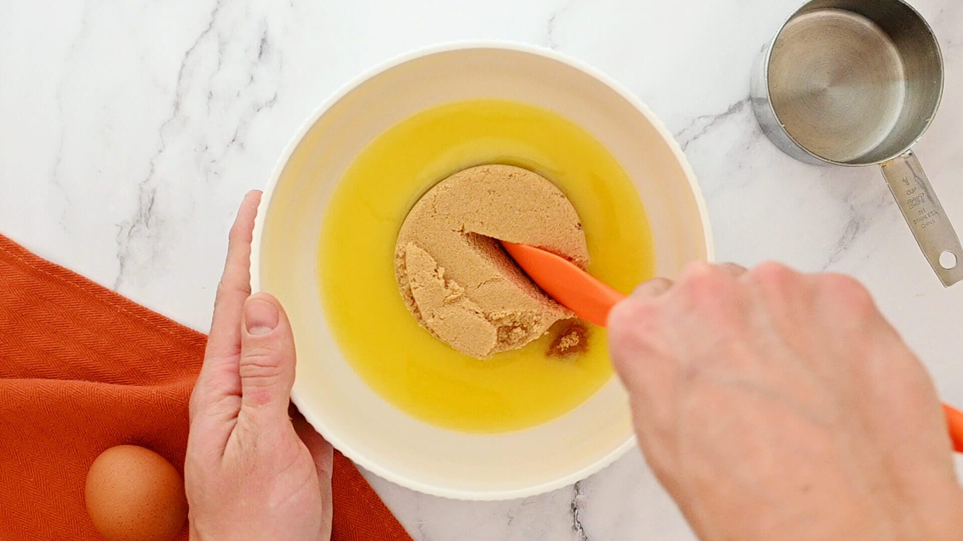 mixing bowl with melter butter and sugar