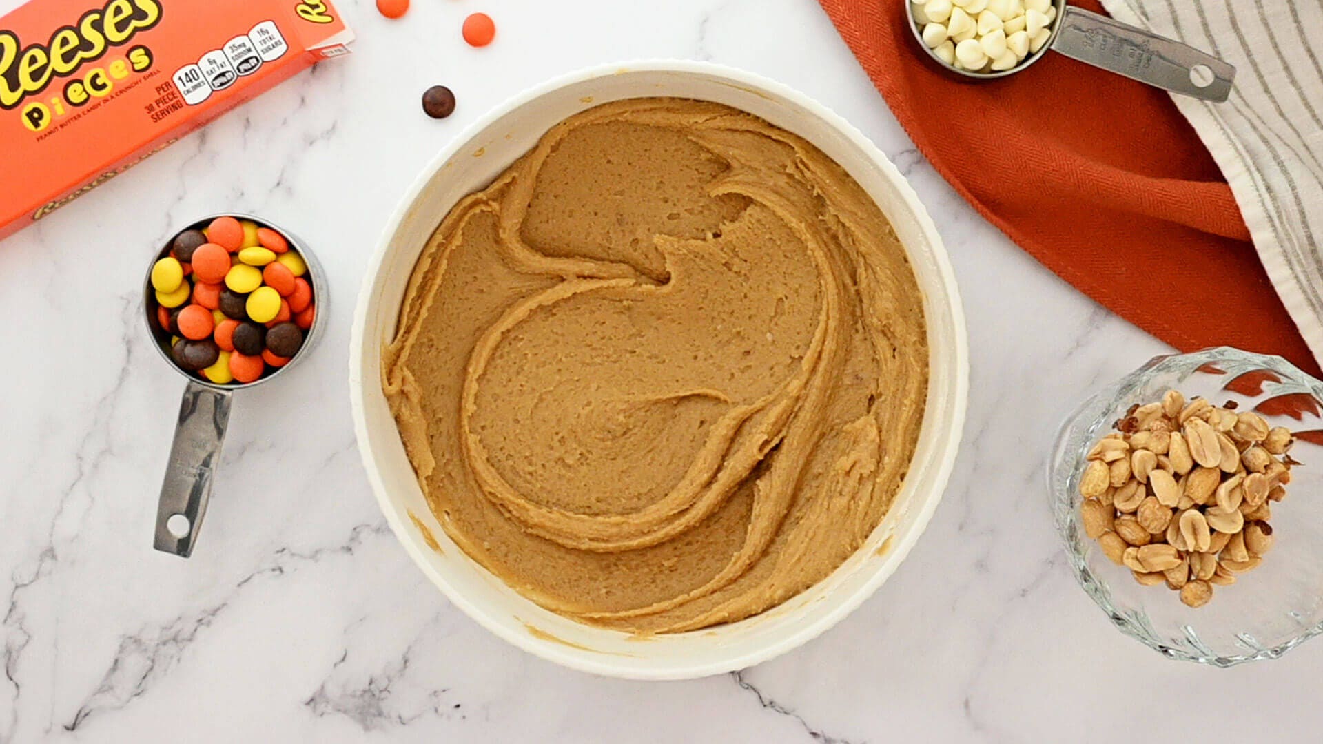 blondie batter before peanuts candies and white creme chips are added