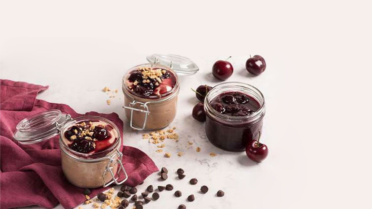 Chocolate Yogurt Granola Bowl With Cherry Compote