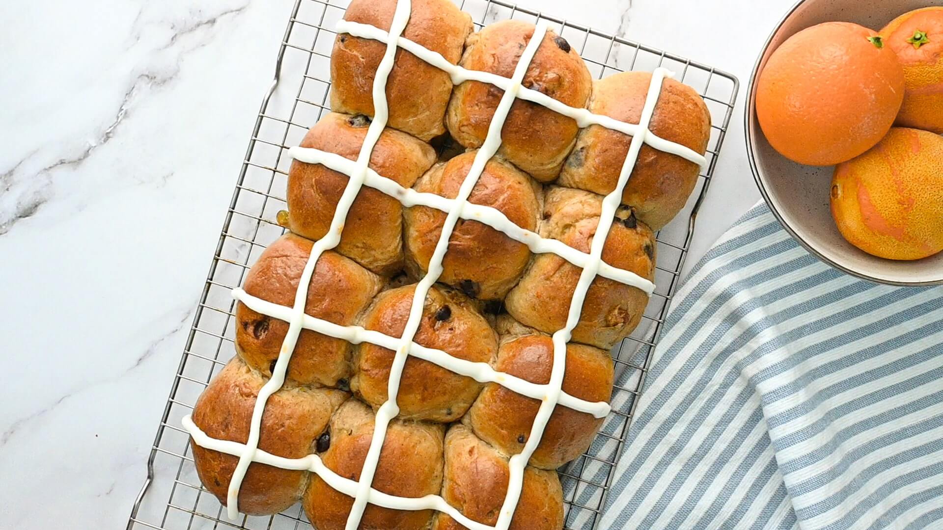 fresh buns being iced
