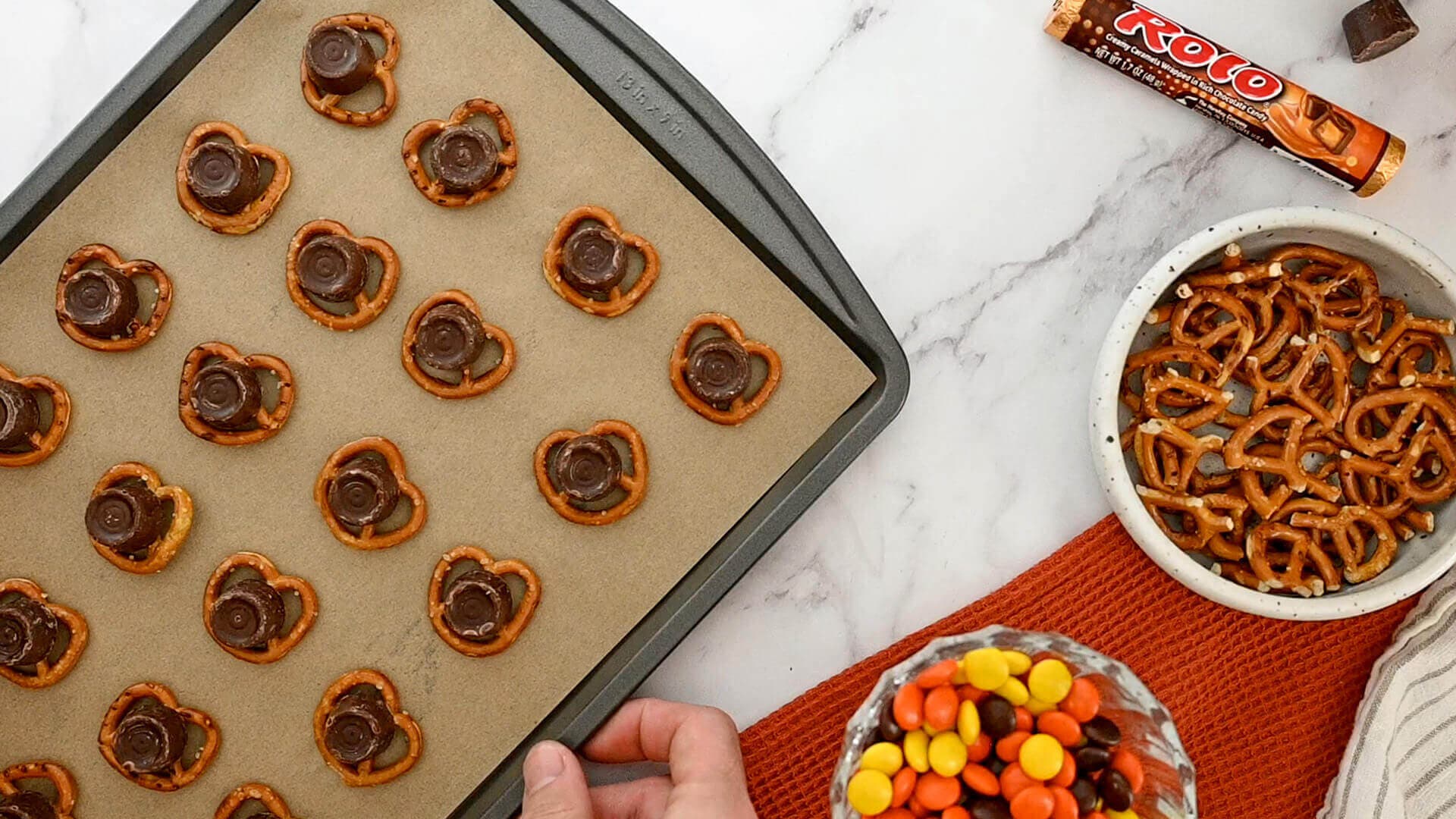 tray of pretzels topped with rolo candies