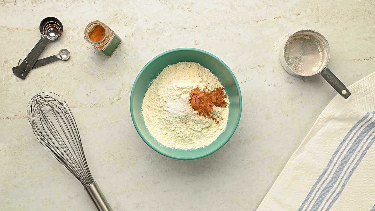 mixing flour, cinnamon, baking soda, and salt together in a small bowl