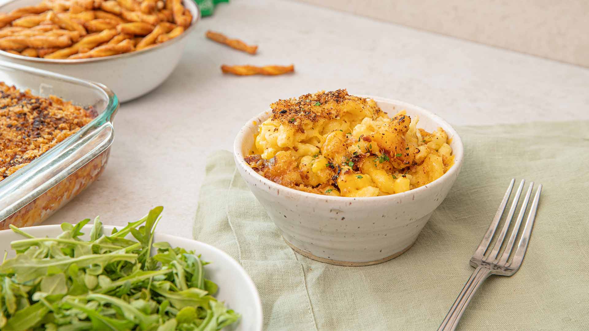 bowl of freshly made dots pretzel crusted mac and cheese ready to serve
