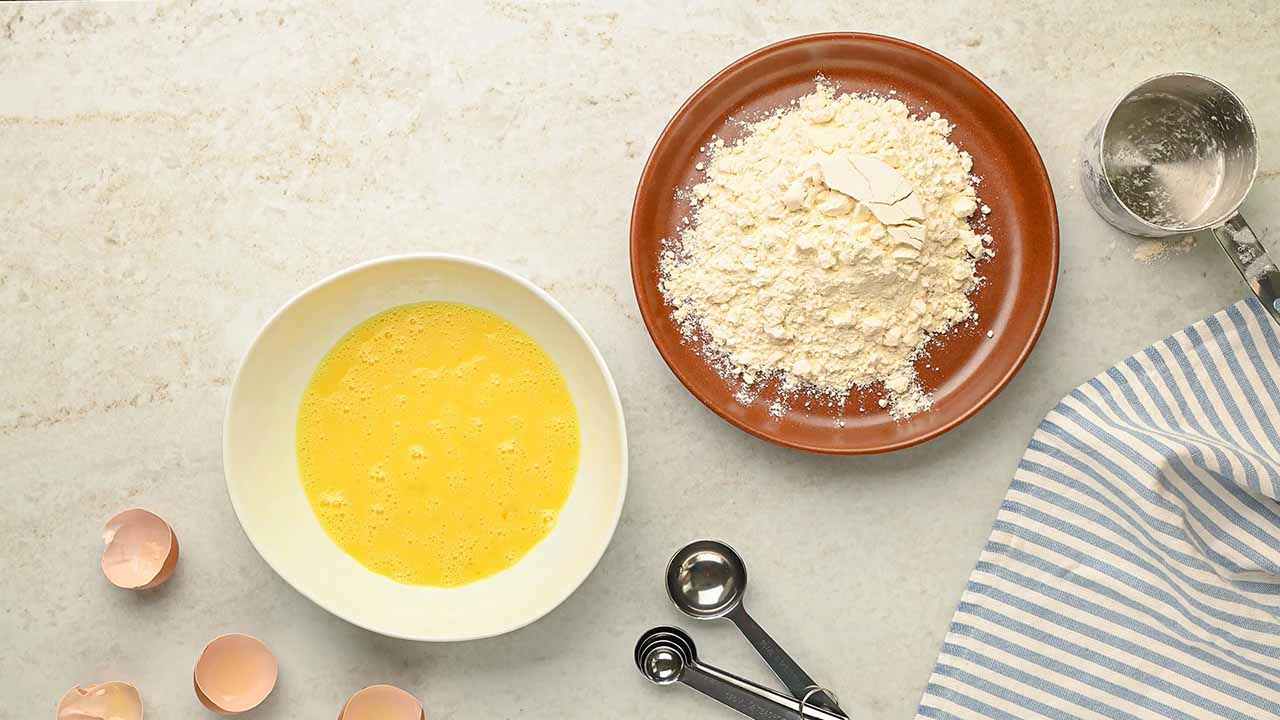 adding all purpose flour into a small bowl