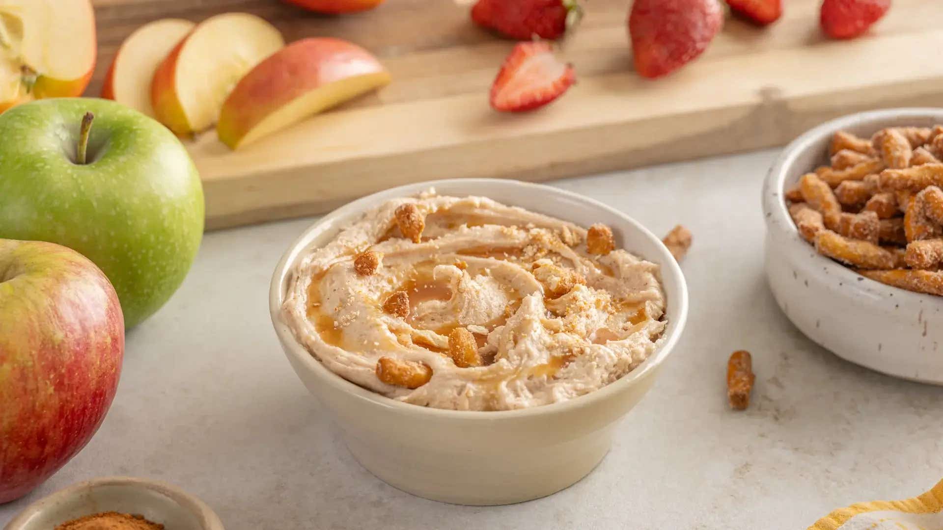 bowl of dots cinnamon caramel pretzel dip paired with fruit for dipping