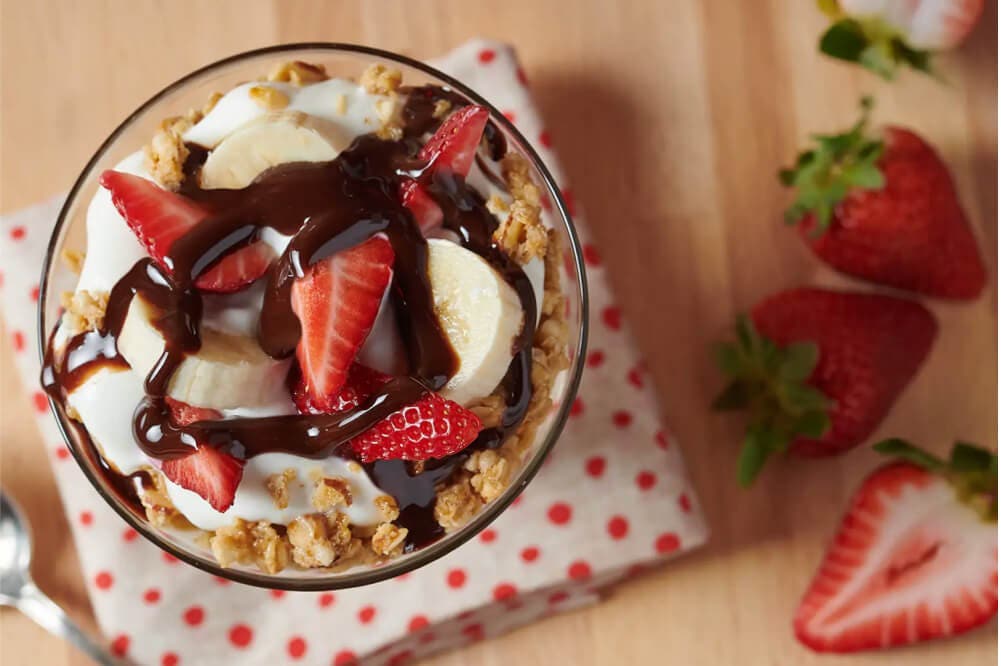 parfait topped with hersheys chocolate syrup