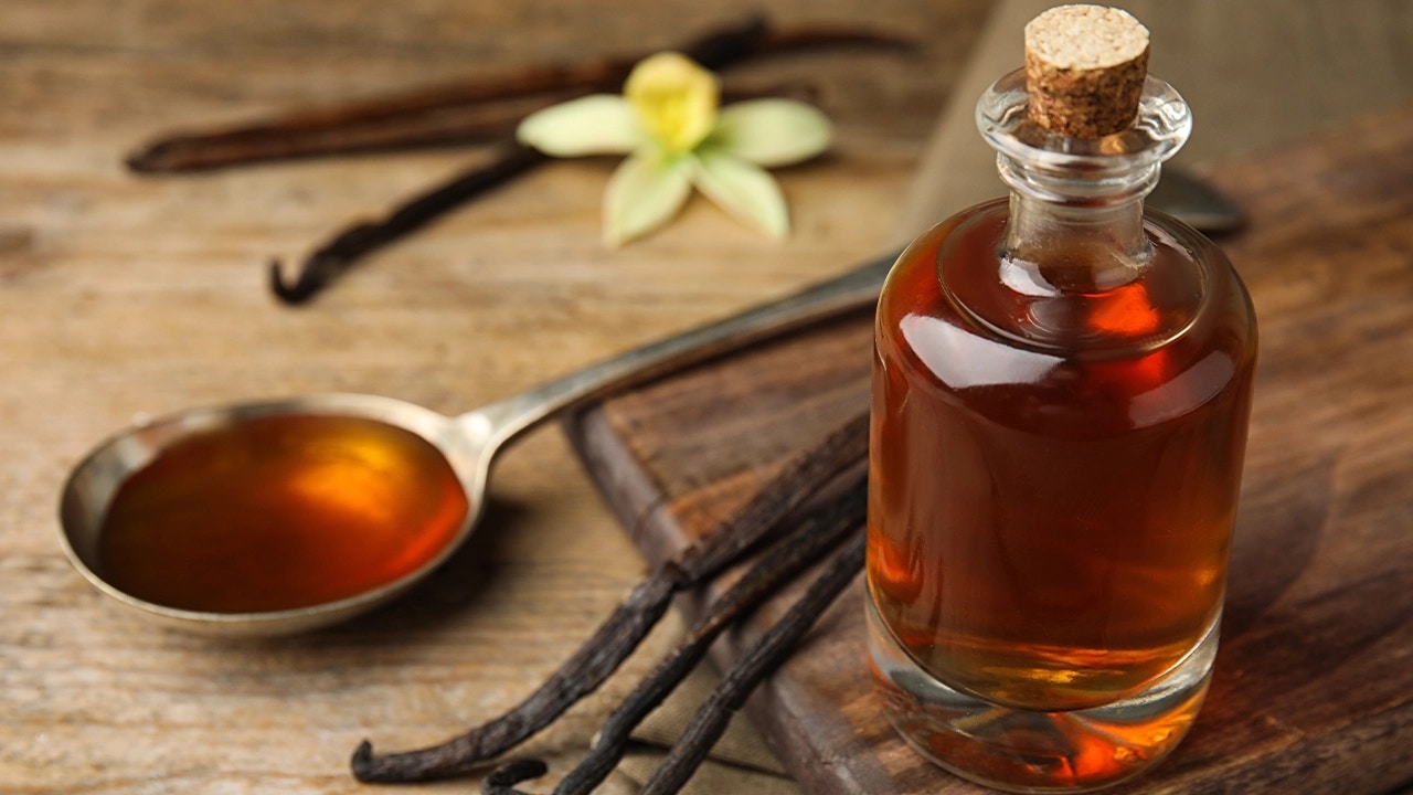 teaspoons and a bottle of vanilla
