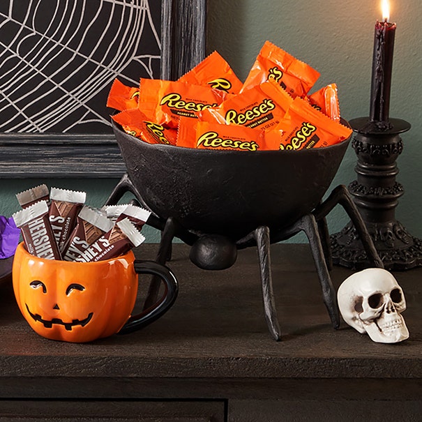 Reese's and hershey bars in halloween themed bowls