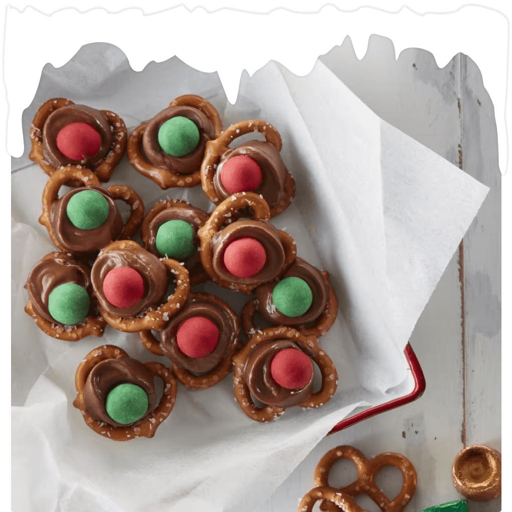 tray of holiday themed rolo pretzel delights