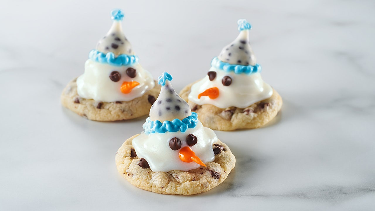 batch of freshly made hersheys snowman sugar cookies