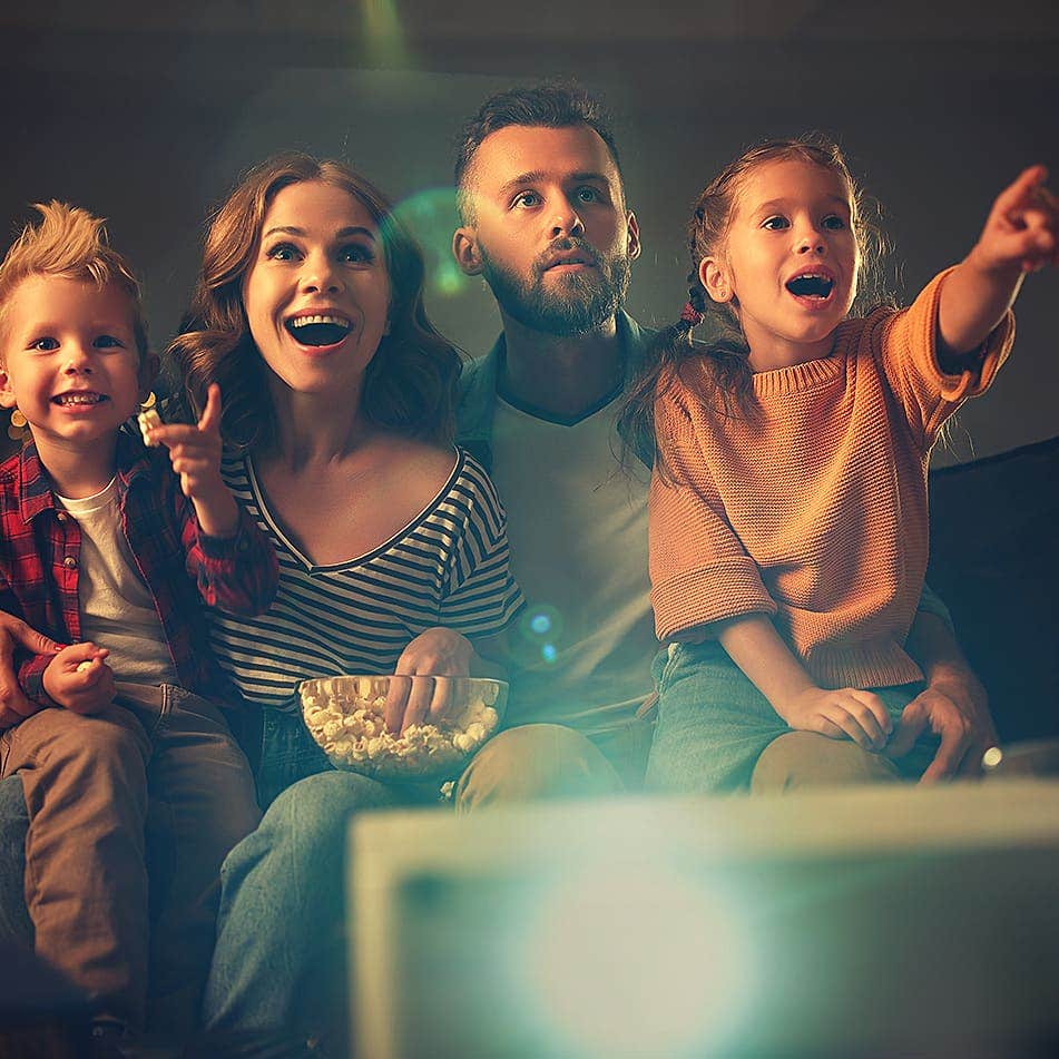 Family watching movie together