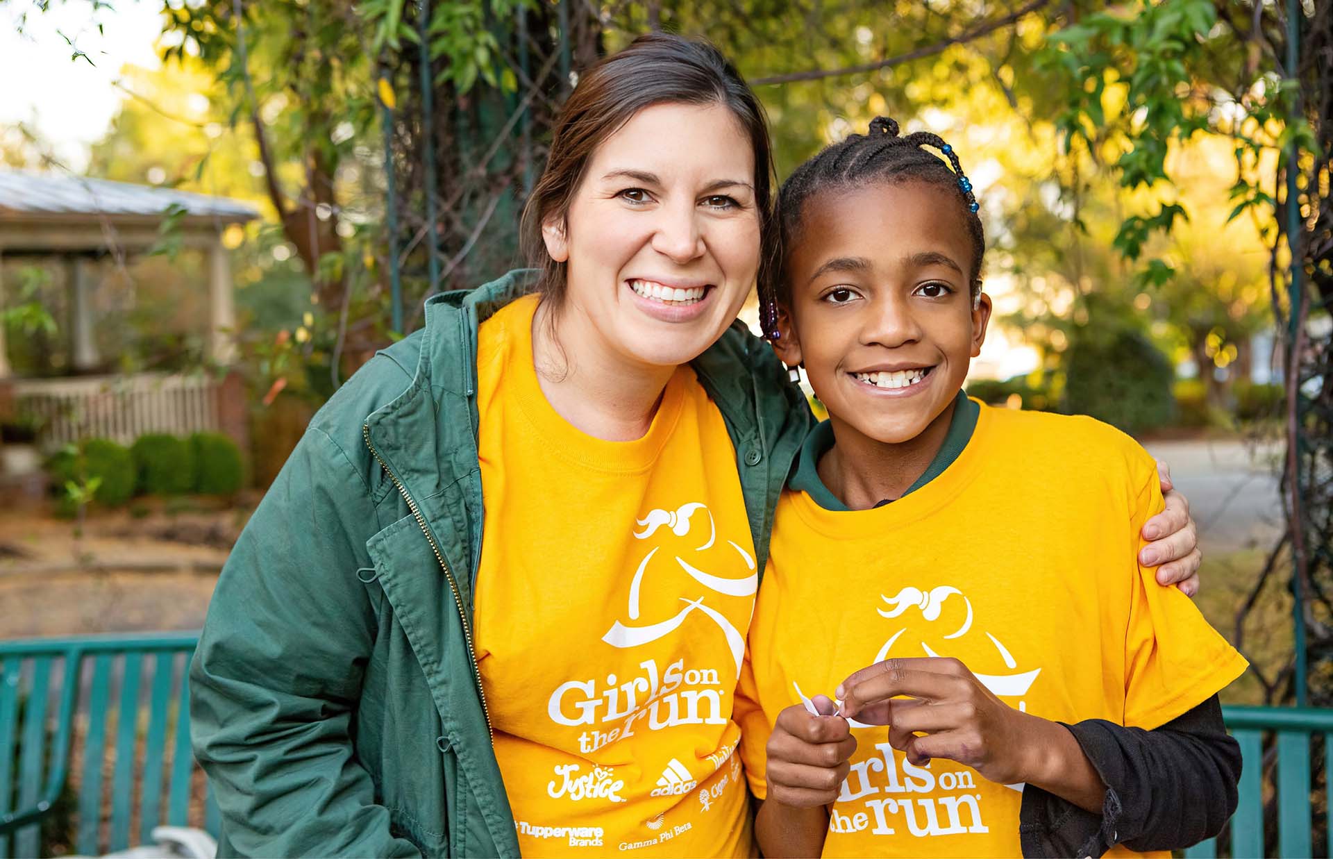 Photo of a Girls on the Run volunteer and a girl