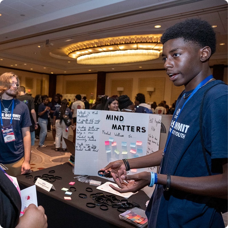 Child presenting to a group