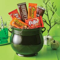 witch's cauldron filled with hersheys candy bars