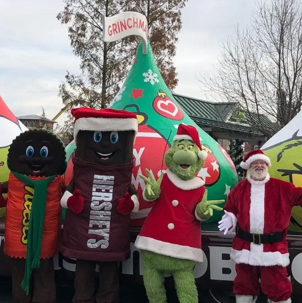 hershey mascots and the grinch on a parade float