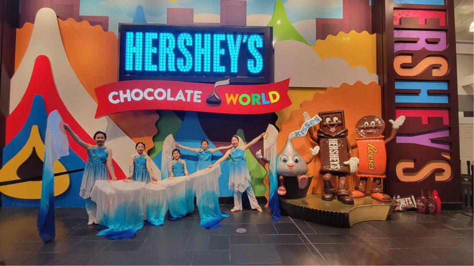 children performing at hersheys chocolate world for the lunar new year celebration
