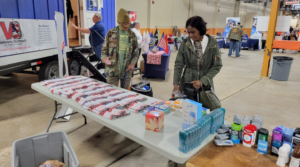 veterans looking at a table of free everyday items