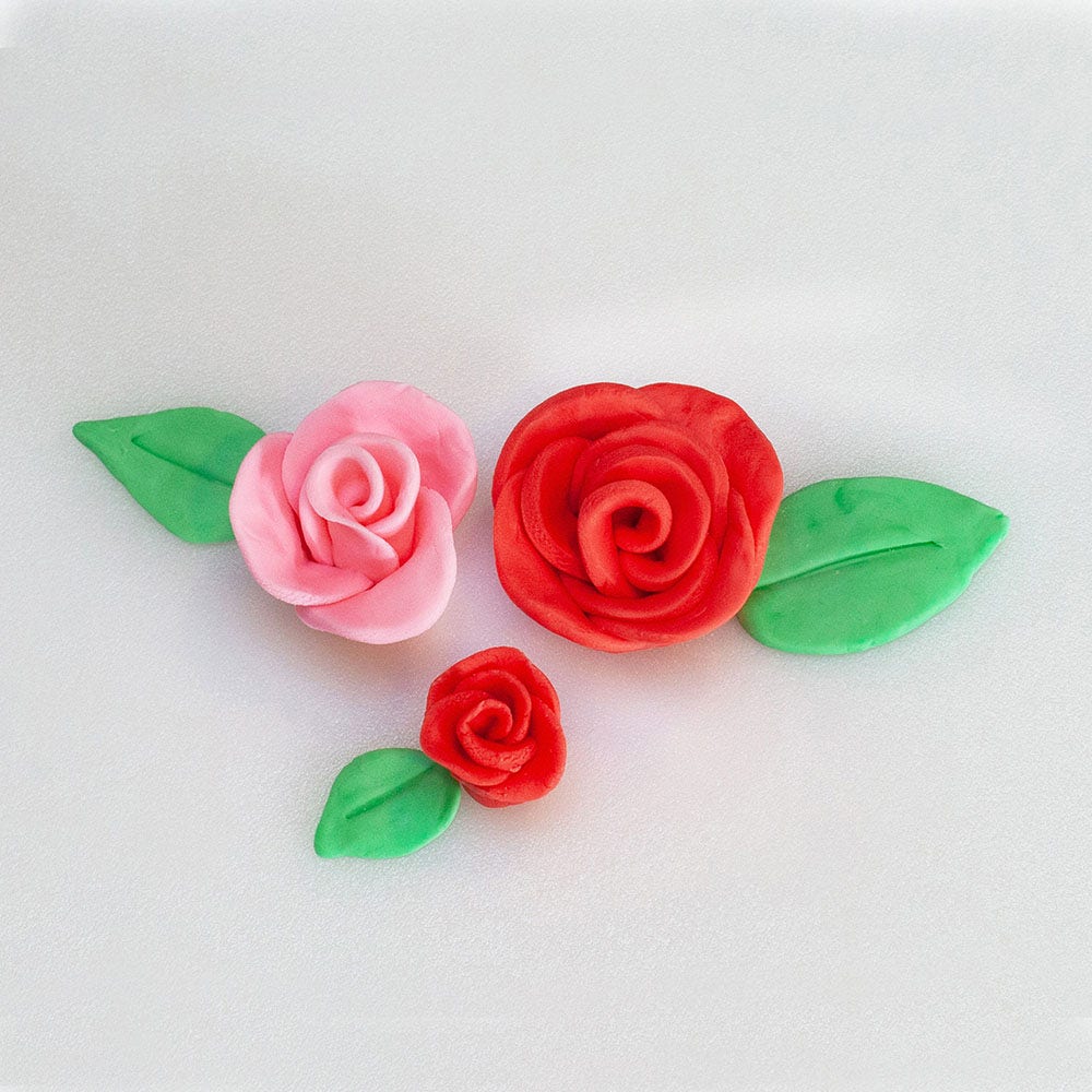 red and pink fondant roses