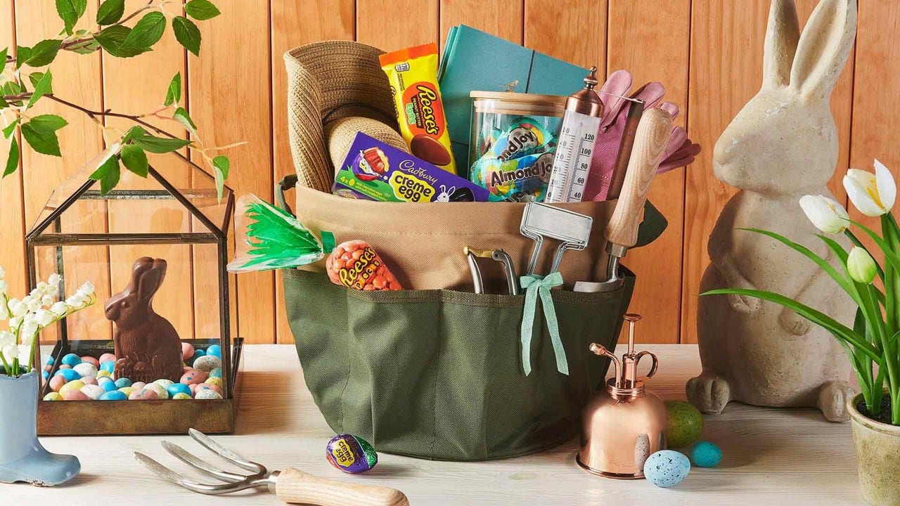 Gardening-themed gift basket with gardening tools and Hershey’s Candy